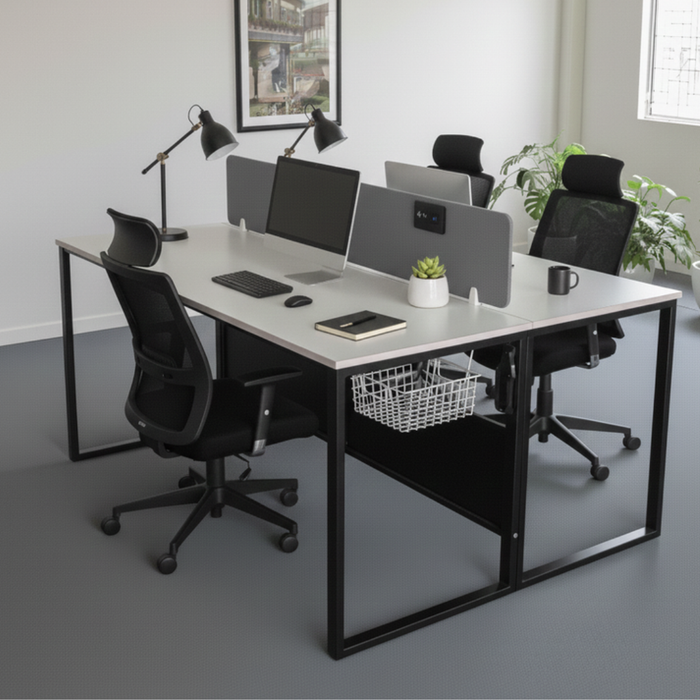 Modern office setup with a large desk, chairs, and computer monitors.